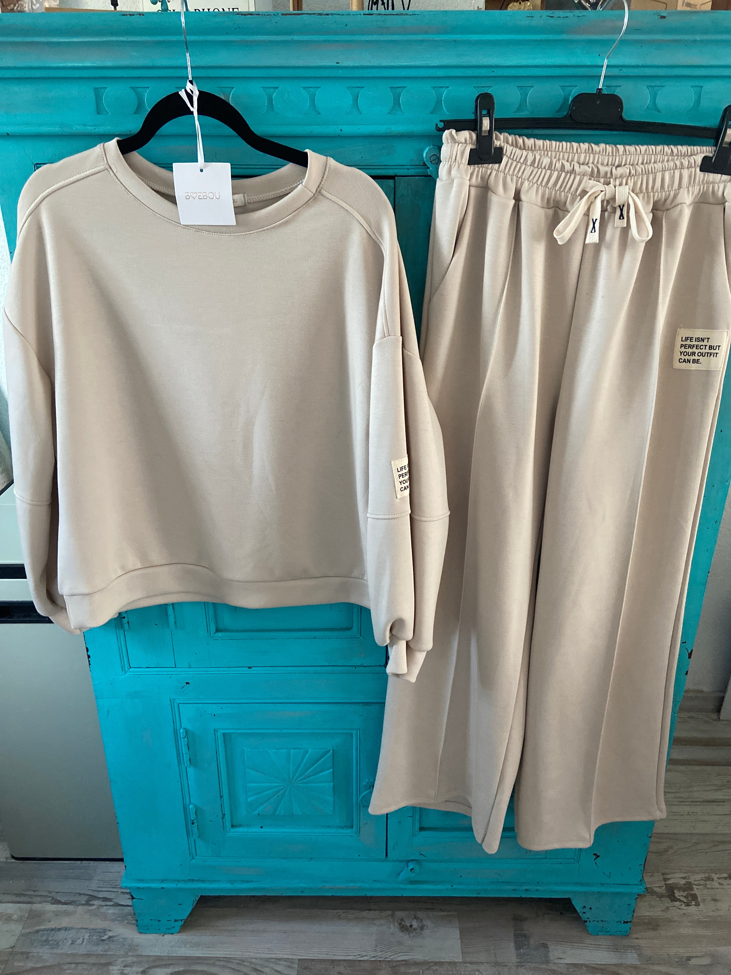 Pak sweater en broek