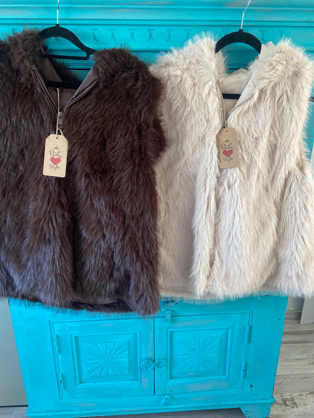 Bodywarmer fluffy capuchon