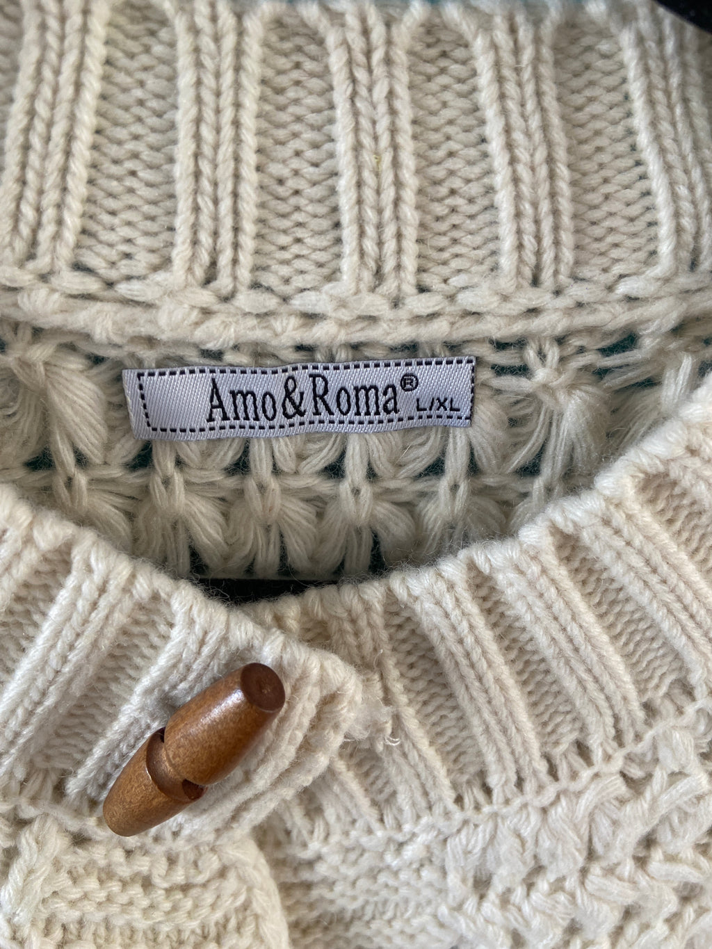 Vestje gebreid houtje touwtje