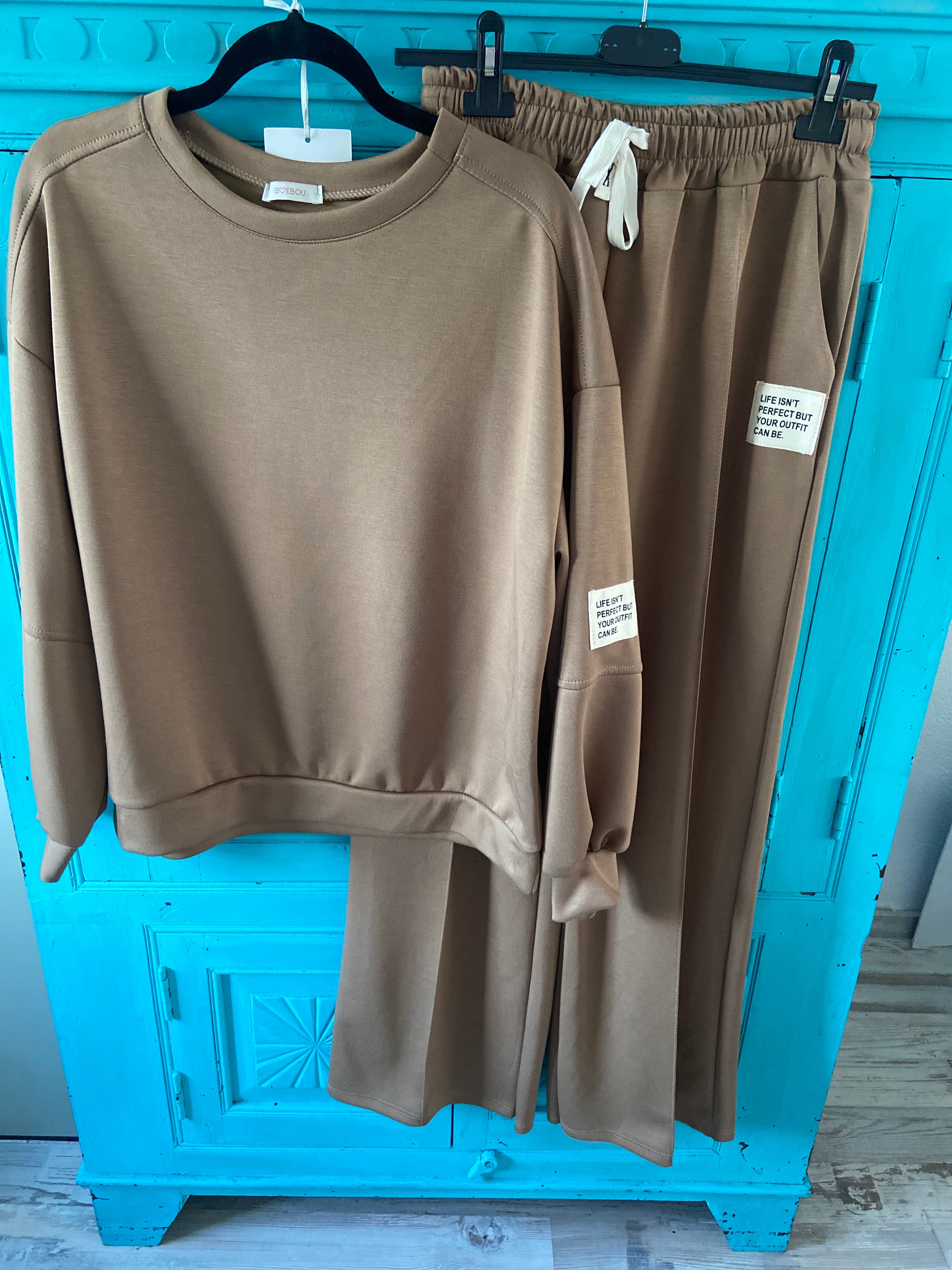 Pak sweater en broek