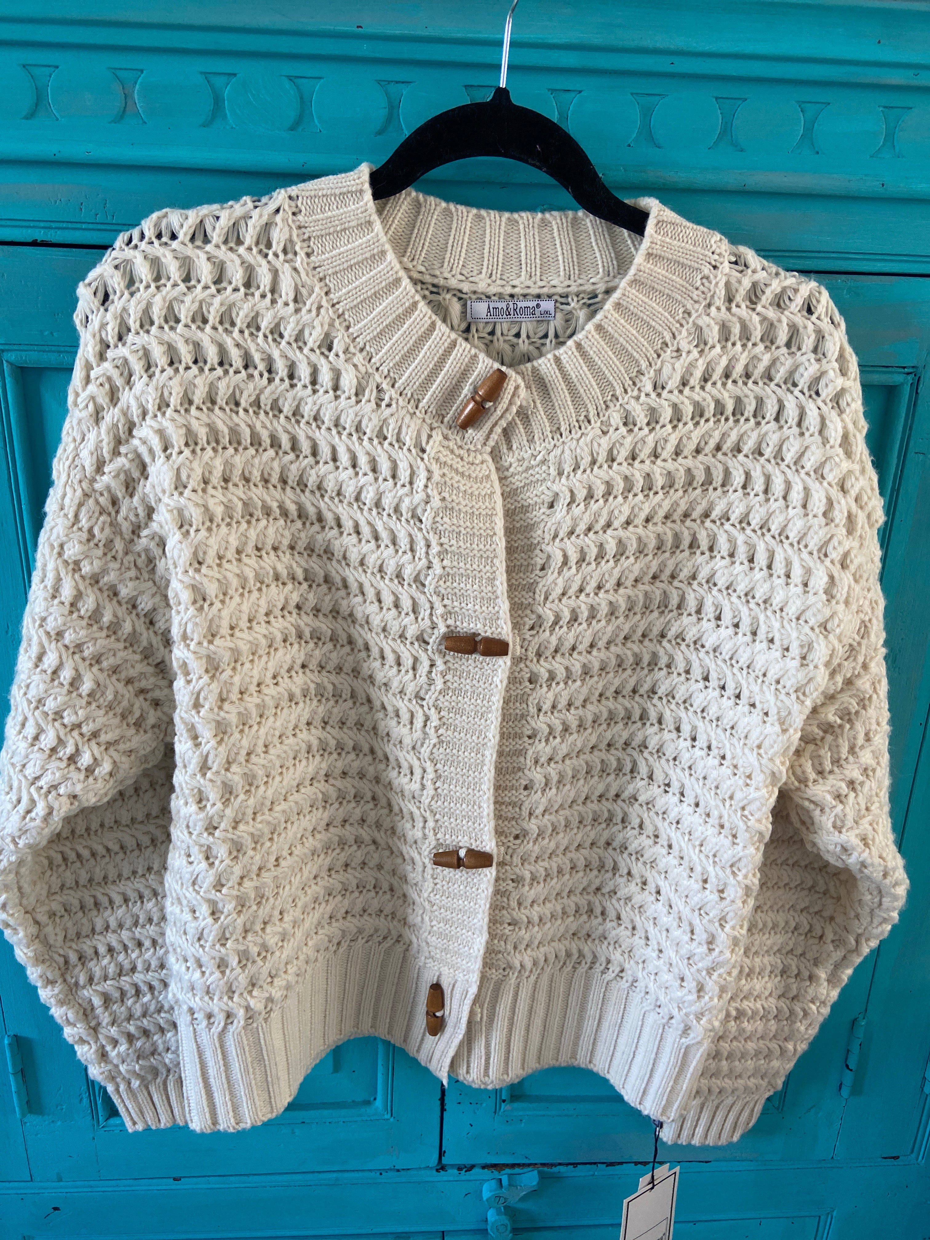 Vestje gebreid houtje touwtje